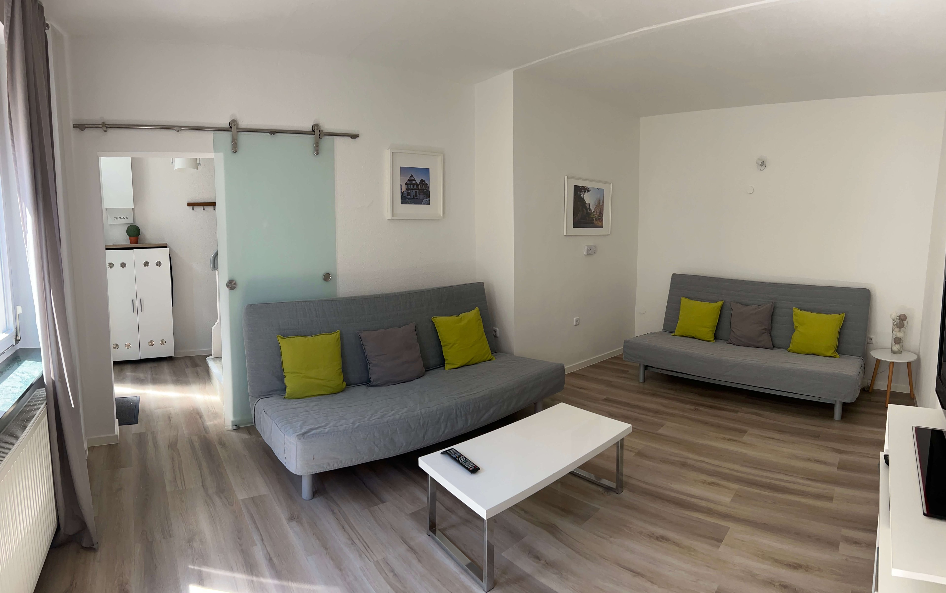 Quartier 26 – Wohnzimmer Panorama mit Schlafcouchen